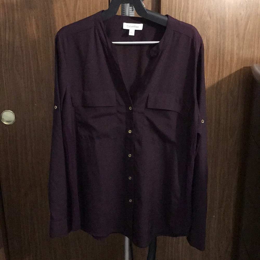 Purple Calvin Klein blouse with gold buttons